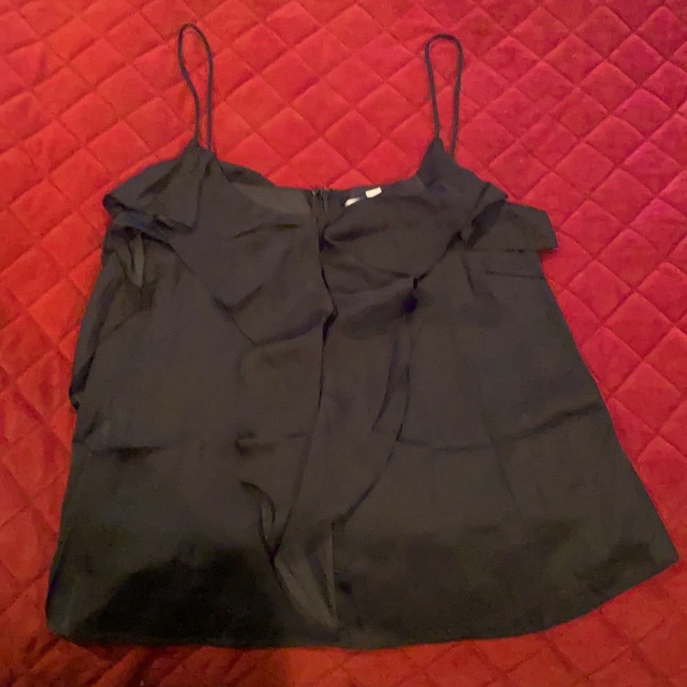 Brand by Honey Punch. Black tank top with ruffles over it size Large.